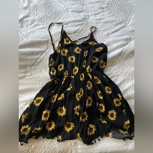 Sunflower romper. Adjustable straps and zipper. L